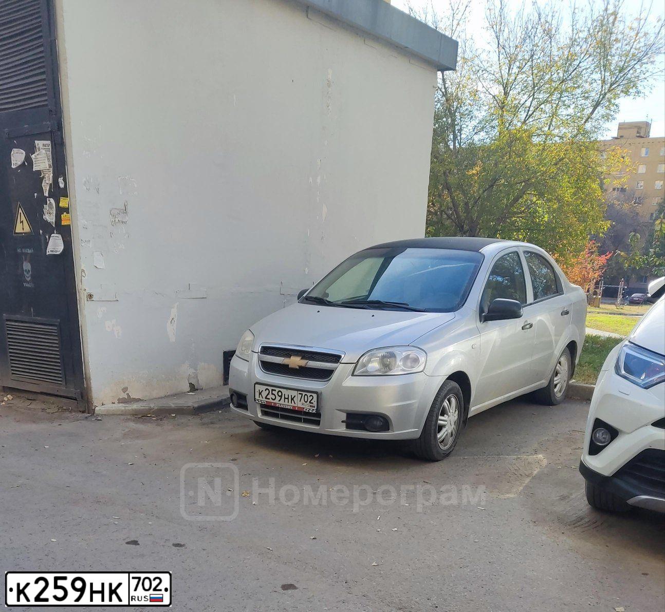 Фото автомобиля CHEVROLET AVEO, 2011 — госномер К259НК702. Цвет: Серебристый