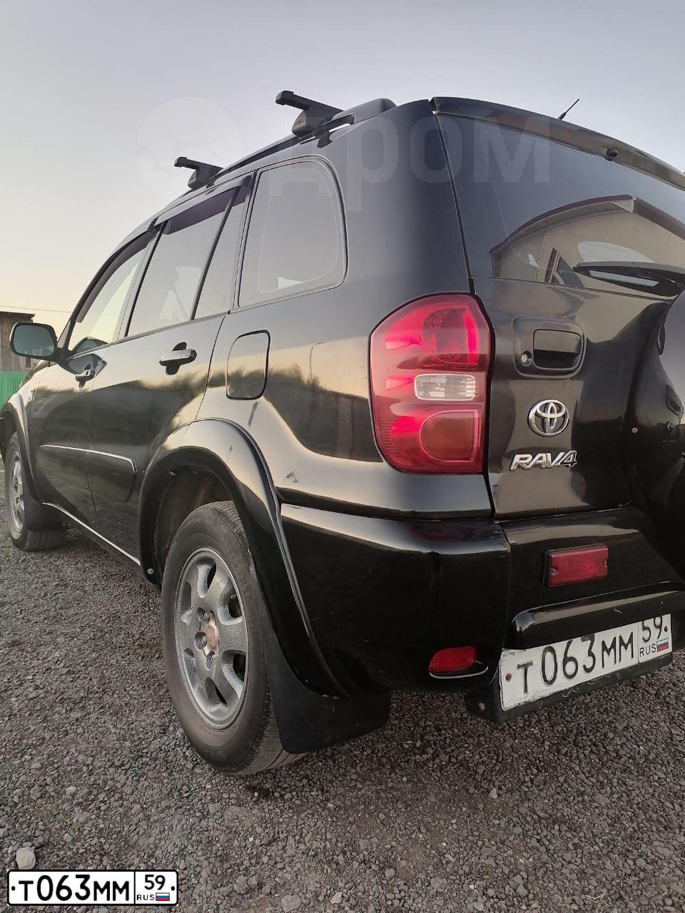 Фото автомобиля CHEVROLET T NIVA, 2010 — госномер Т068ММ59. Цвет: СЕРО-КОРИЧНЕВЫЙ МЕТАЛЛИК