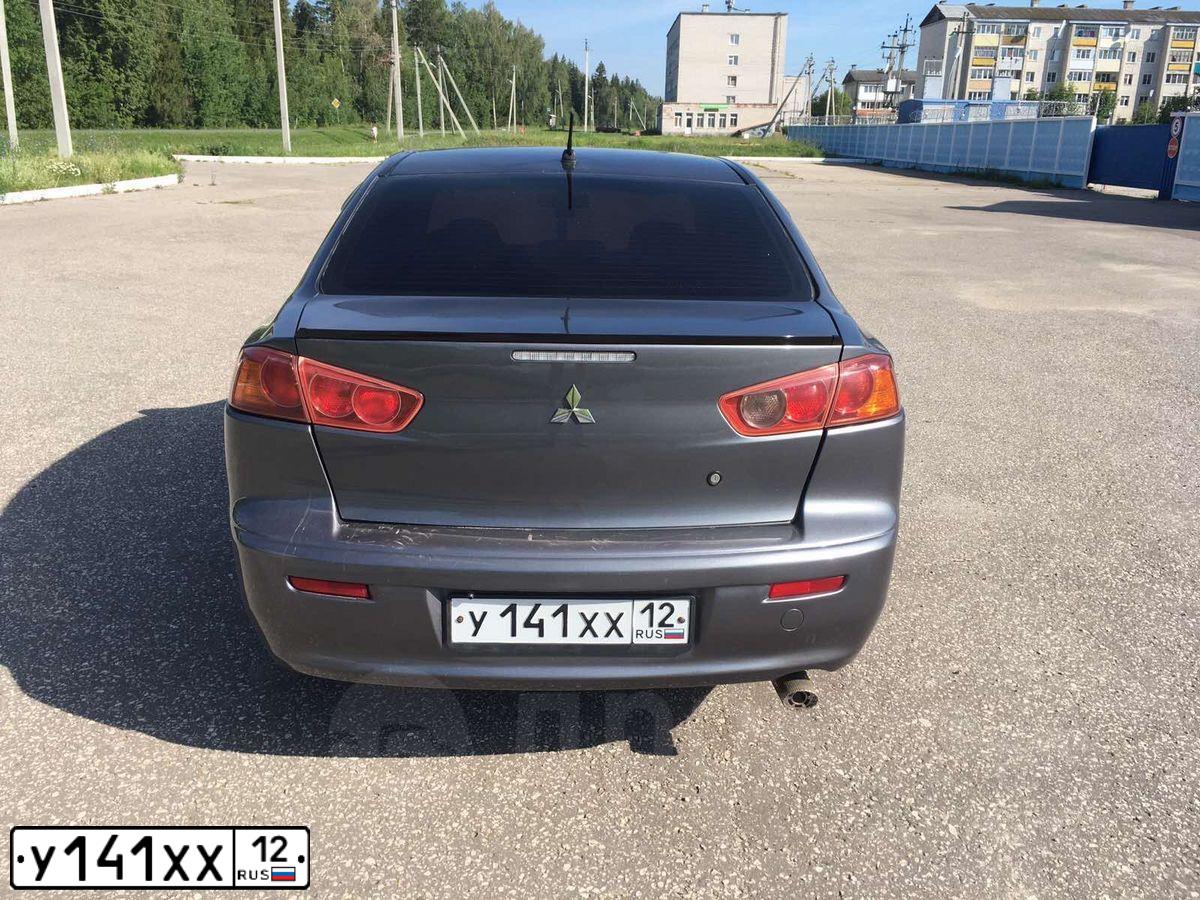 Фото автомобиля MITSUBISHI LANCER, 2008 — госномер М089ОЕ21. Цвет: Серый