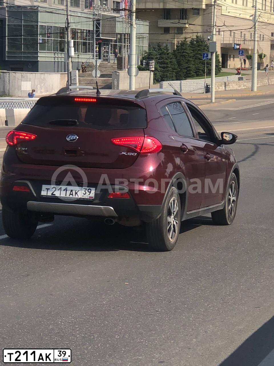 Фото автомобиля LIFAN X 50, 2016 — госномер Т211АК39. Цвет: ТЕМНО-ВИШНЕВЫЙ