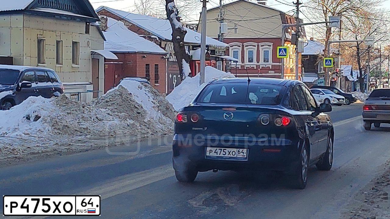 Фото автомобиля MAZDA 3, 2006 — госномер Р475ХО64. Цвет: СИНЕ ЗЕЛЕНЫЙ