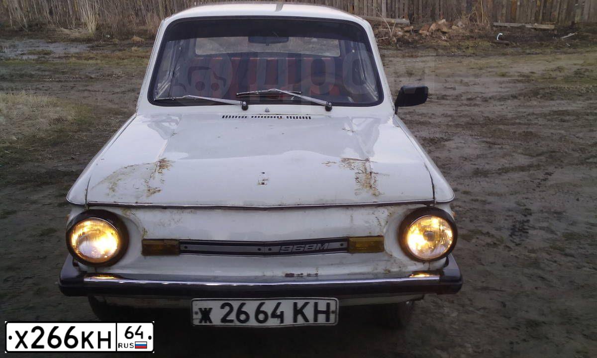 Фото автомобиля NISSAN NOTE, 2010 — госномер Х266КН64. Цвет: СЕРЕБРИСТЫЙ