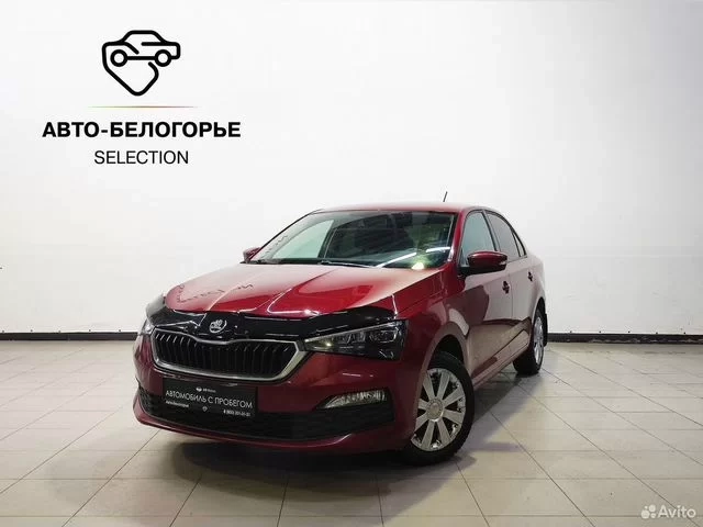 Фото автомобиля SKODA RAPID, 2020 — госномер Е749ЕВ136. Цвет: Красный