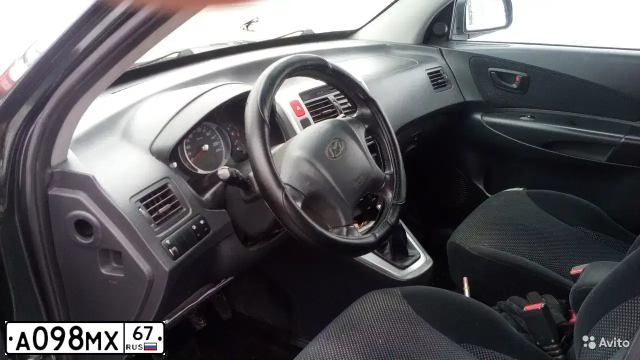 Фото автомобиля HYUNDAI TUCSON, 2008 — госномер А098МХ67. Цвет: Темно-зеленый