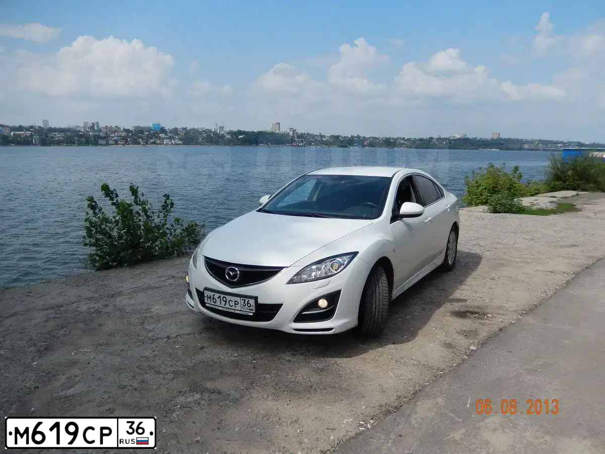 Фото автомобиля MAZDA 6, 2011 — госномер М619СР36. Цвет: Белый