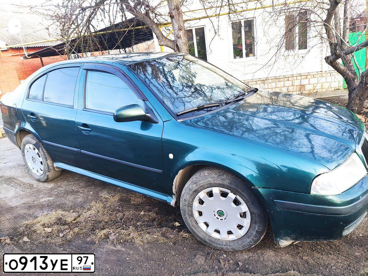 Фото автомобиля SKODA OCTAVIA, 2004 — госномер Т183ЕУ136. Цвет: ЗЕЛЕНЫЙ