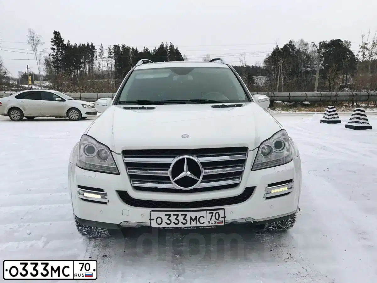 Фото автомобиля TOYOTA LANDCRUISER, 2010 — госномер О333МС70. Цвет: БЕЖЕВЫЙ