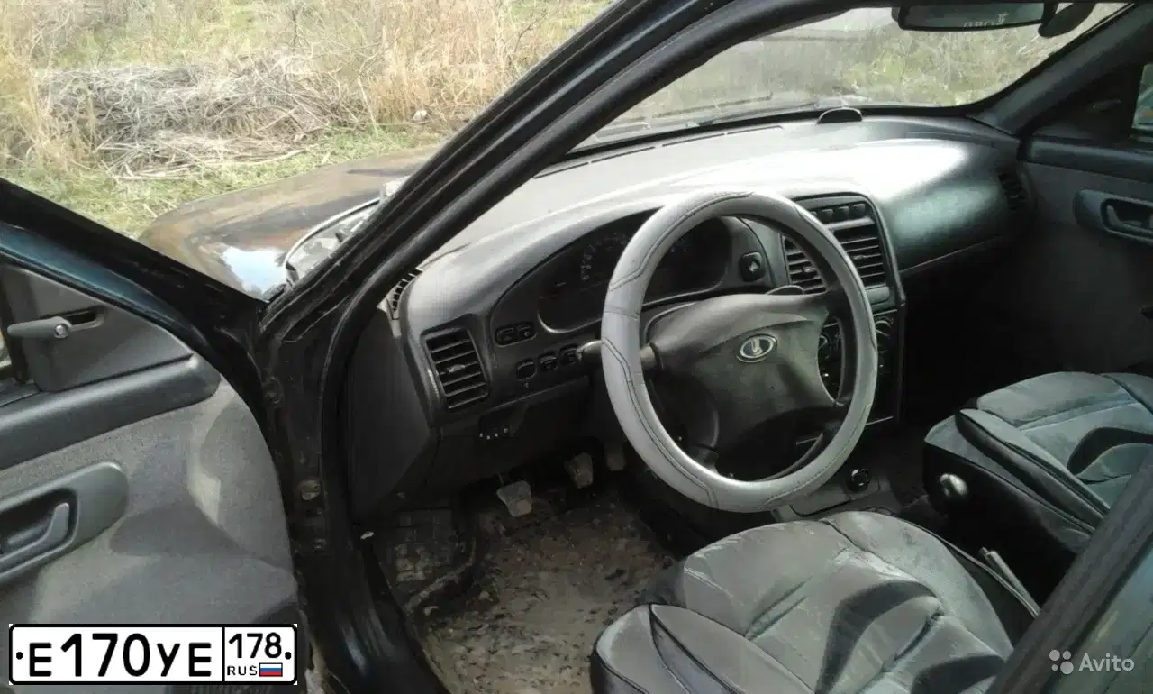 Фото автомобиля LADA 2111, 2006 — госномер Е170УЕ178. Цвет: Темно-зеленый