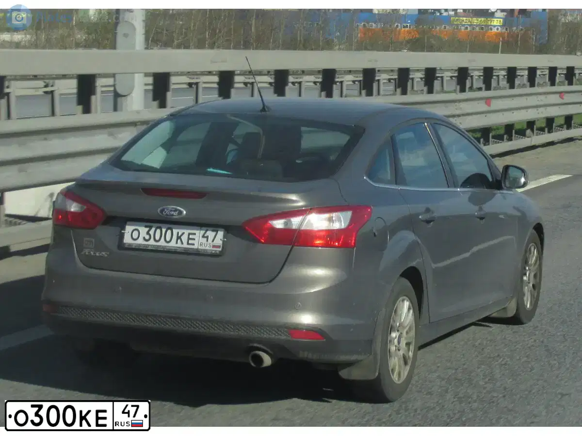 Фото автомобиля FORD FOCUS, 2012 — госномер О300КЕ47. Цвет: СЕРО-КОРИЧНЕВЫЙ