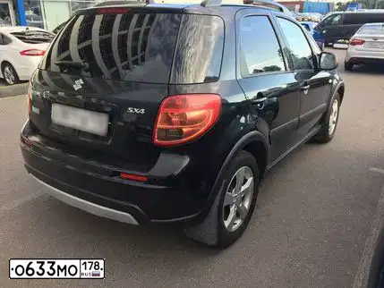 Фото автомобиля BMW X1, 2012 — госномер О633МО178. Цвет: Серебристый