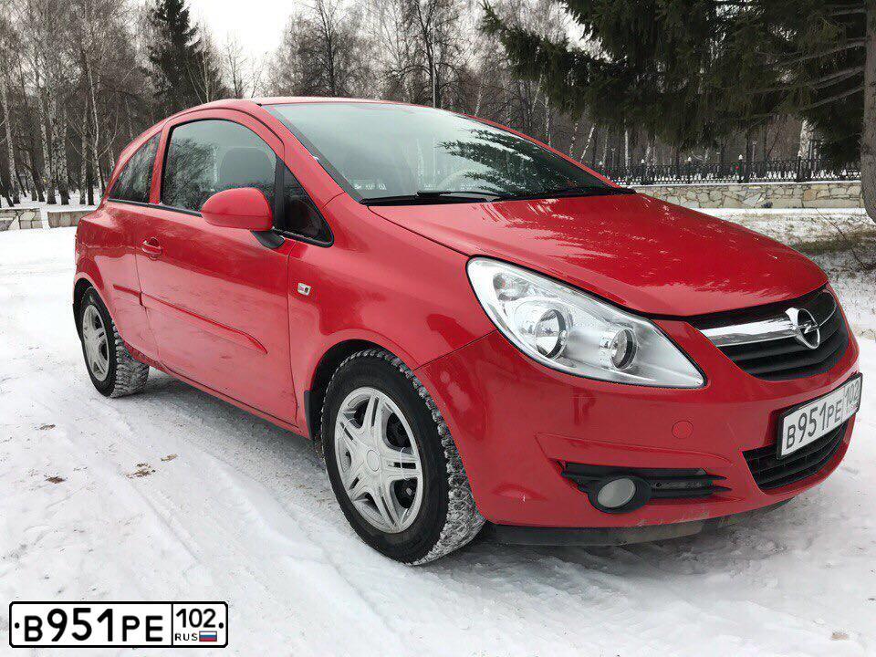 Фото автомобиля OPEL CORSA, 2007 — госномер К742АР702. Цвет: Красный