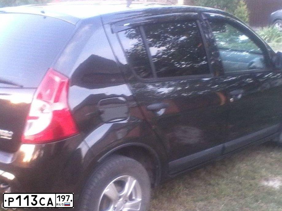 Фото автомобиля RENAULT SANDERO, 2011 — госномер А256МХ761. Цвет: ЧЕРНЫЙ
