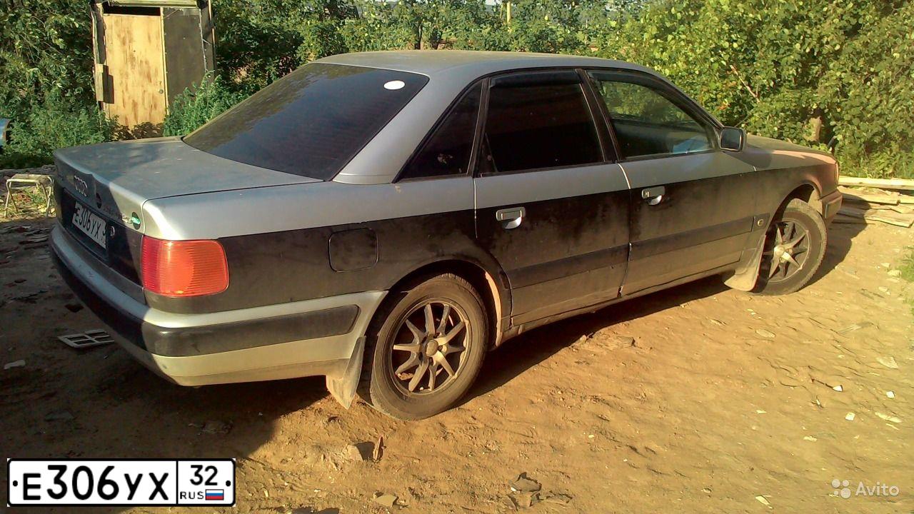Фото автомобиля AUDI 100, 1991 — госномер Е306УХ32. Цвет: СЕРЫЙ