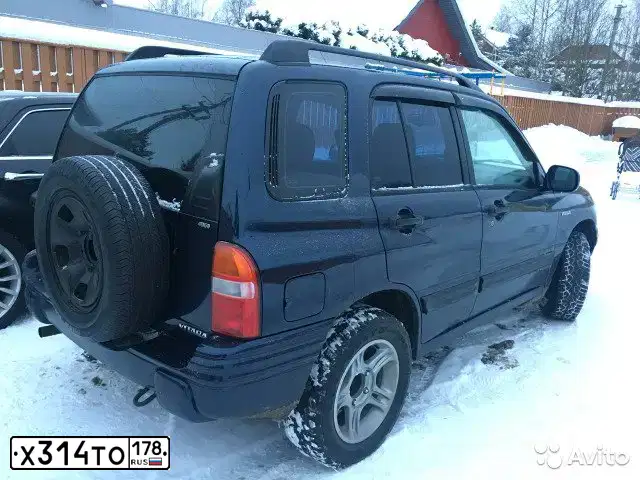 Фото автомобиля SUZUKI /GRAND/ VITARA, 1999 — госномер Х314ТО178. Цвет: СИНИЙ