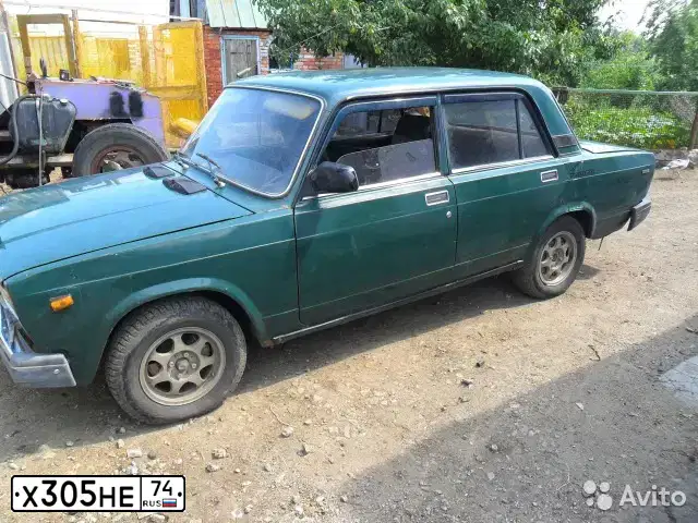 Фото автомобиля LADA 2107, 1999 — госномер Х305НЕ74. Цвет: ЗЕЛЕНЫЙ