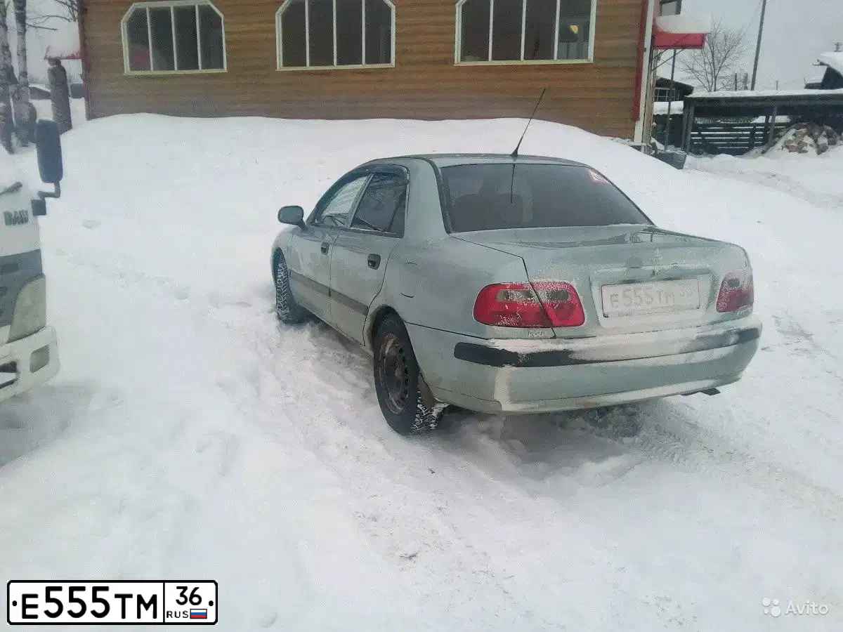 Фото автомобиля HYUNDAI TUCSON, 2006 — госномер О268ОС46. Цвет: ТЕМНО-КРАСНЫЙ