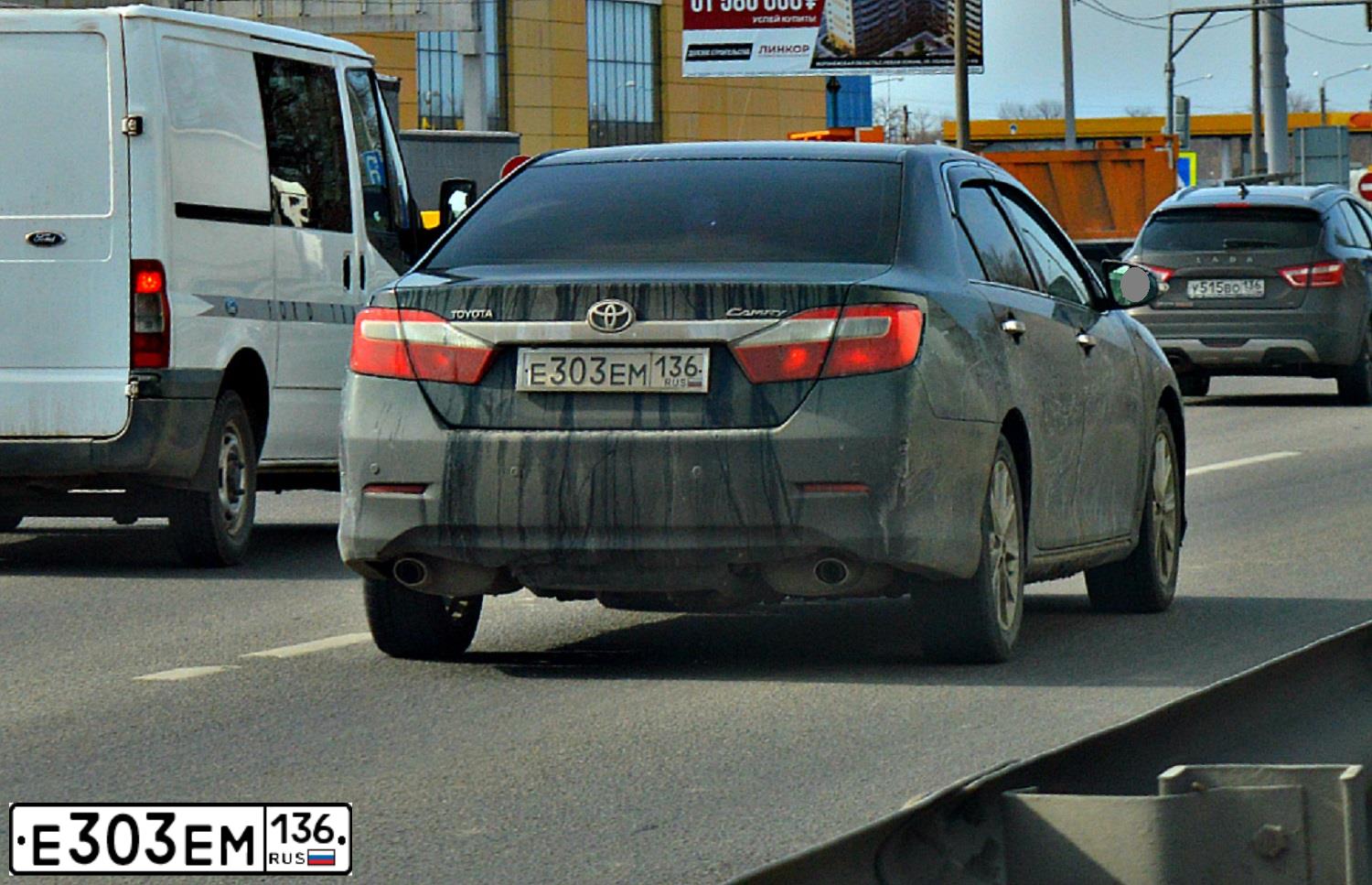Фото автомобиля TOYOTA CAMRY, 2011 — госномер Е303ЕМ136. Цвет: ЧЕРНЫЙ
