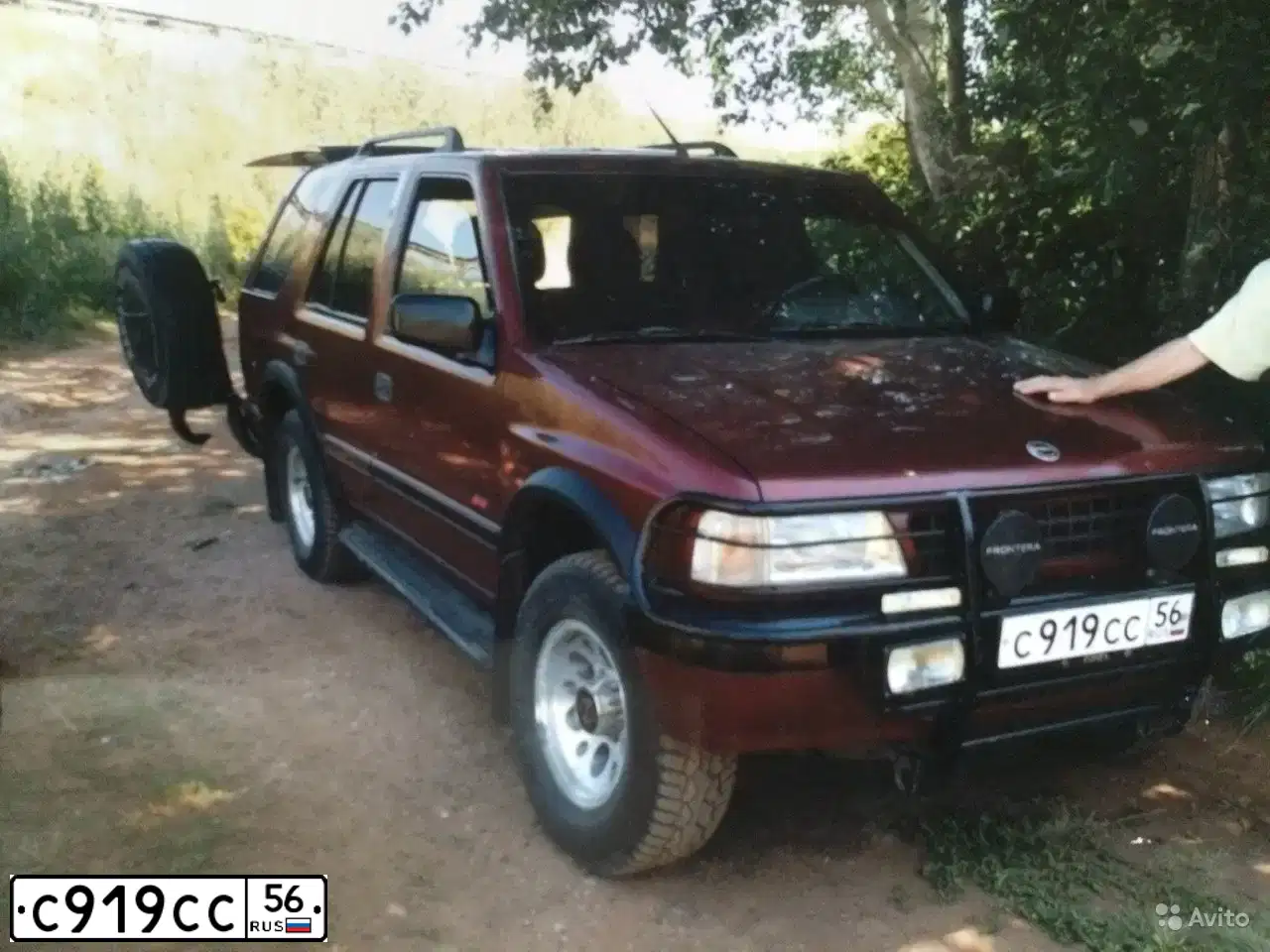 Фото автомобиля OPEL FRONTERA, 1994 — госномер С919СС56. Цвет: Вишневый