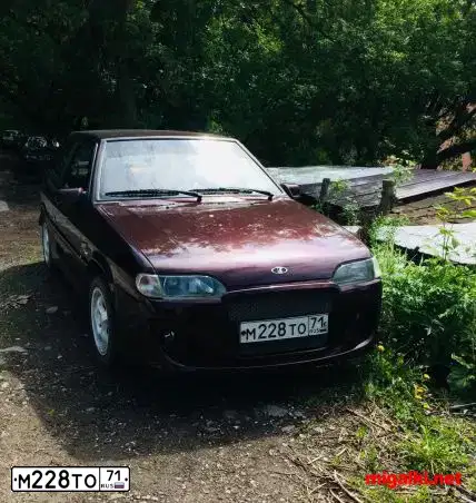 Фото автомобиля LADA 2113 SAMARA, 2011 — госномер М228ТО71. Цвет: ТЕМНО-ВИШНЕВЫЙ