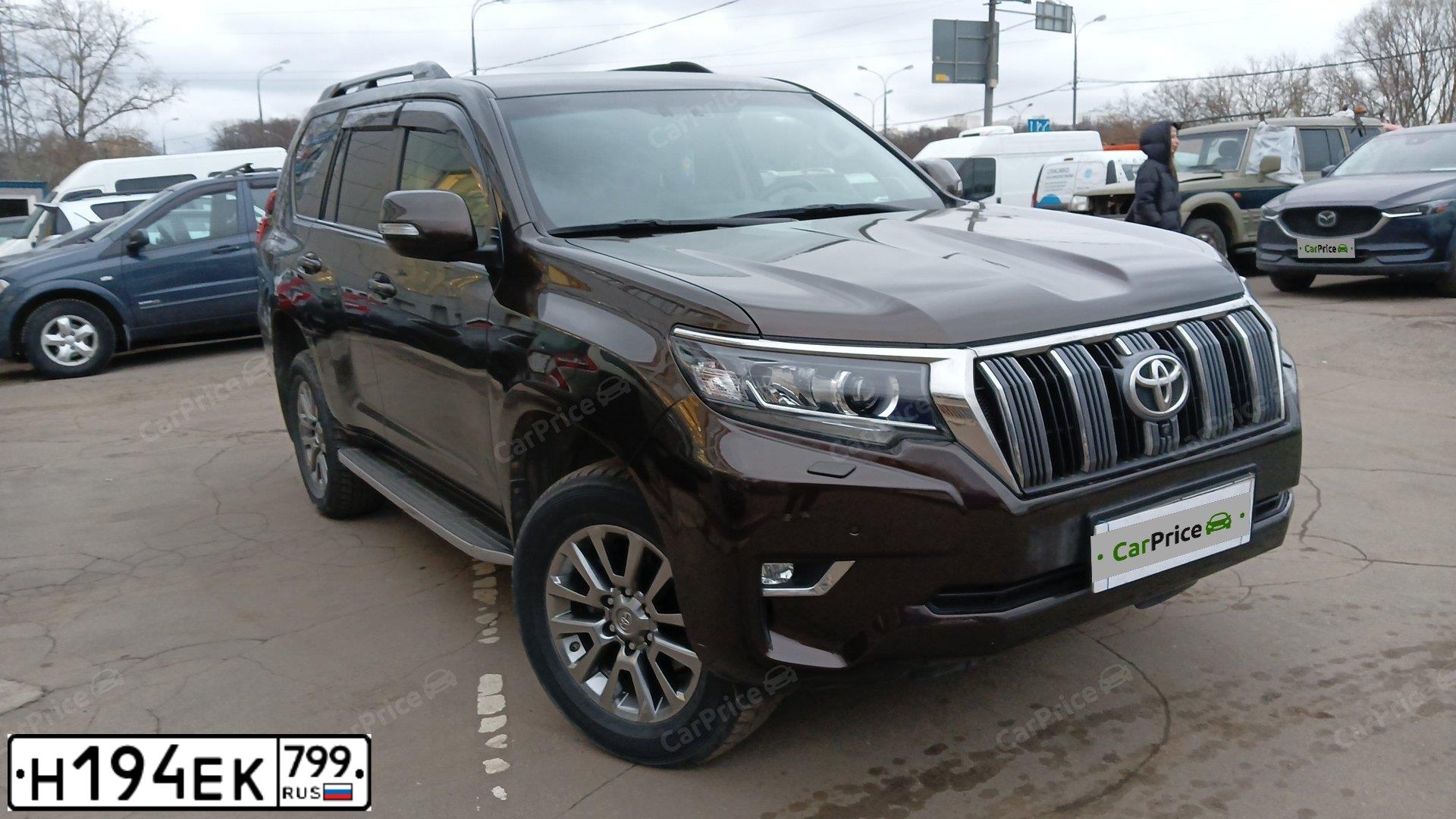 Фото автомобиля TOYOTA LAND CRUISER 150, 2018 — госномер В806УО790. Цвет: Коричневый