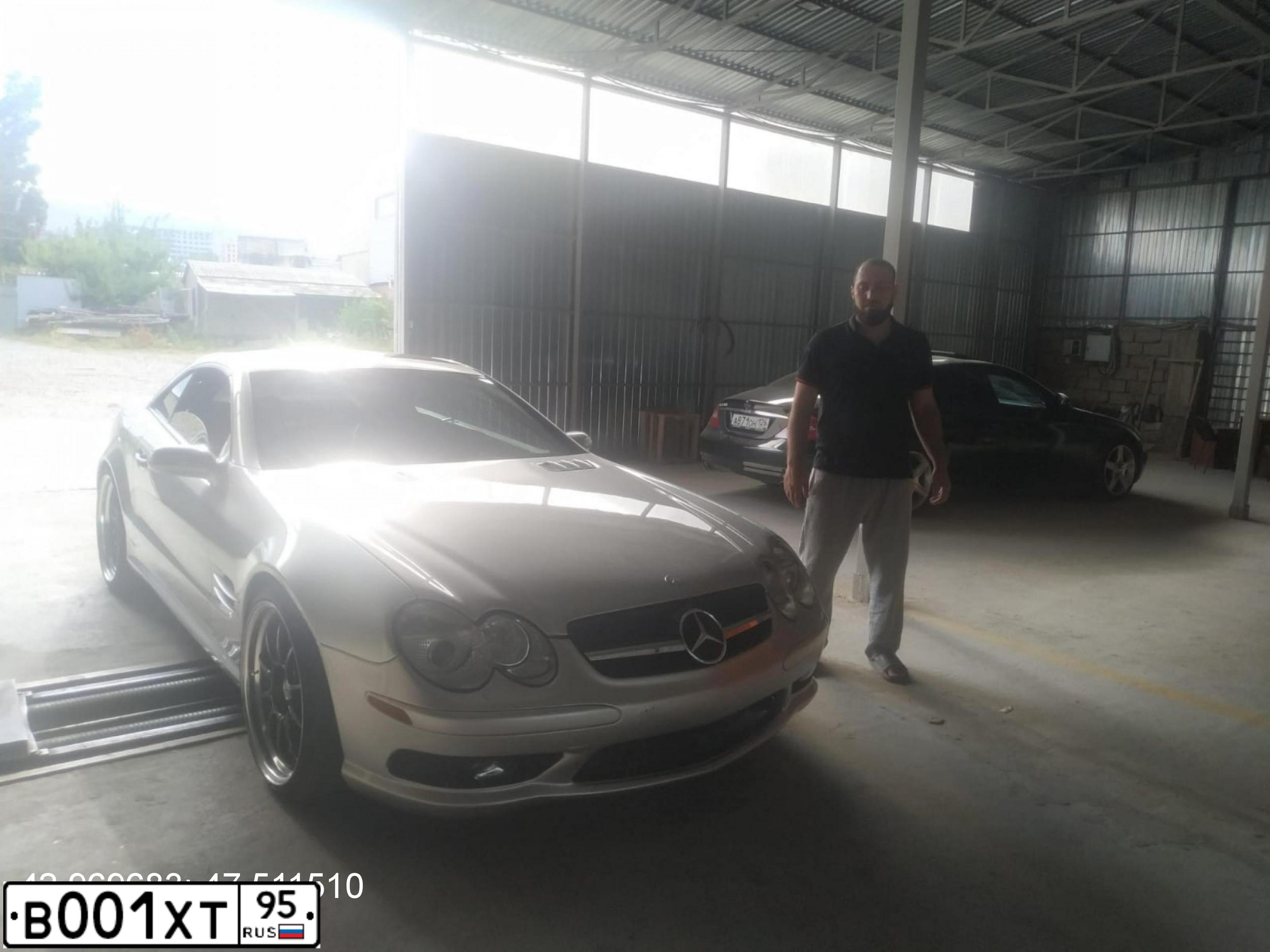 Фото автомобиля МЕРСЕДЕС БЕНЦ SL55, 2003 — госномер Х406ЕС05. Цвет: Серебристый