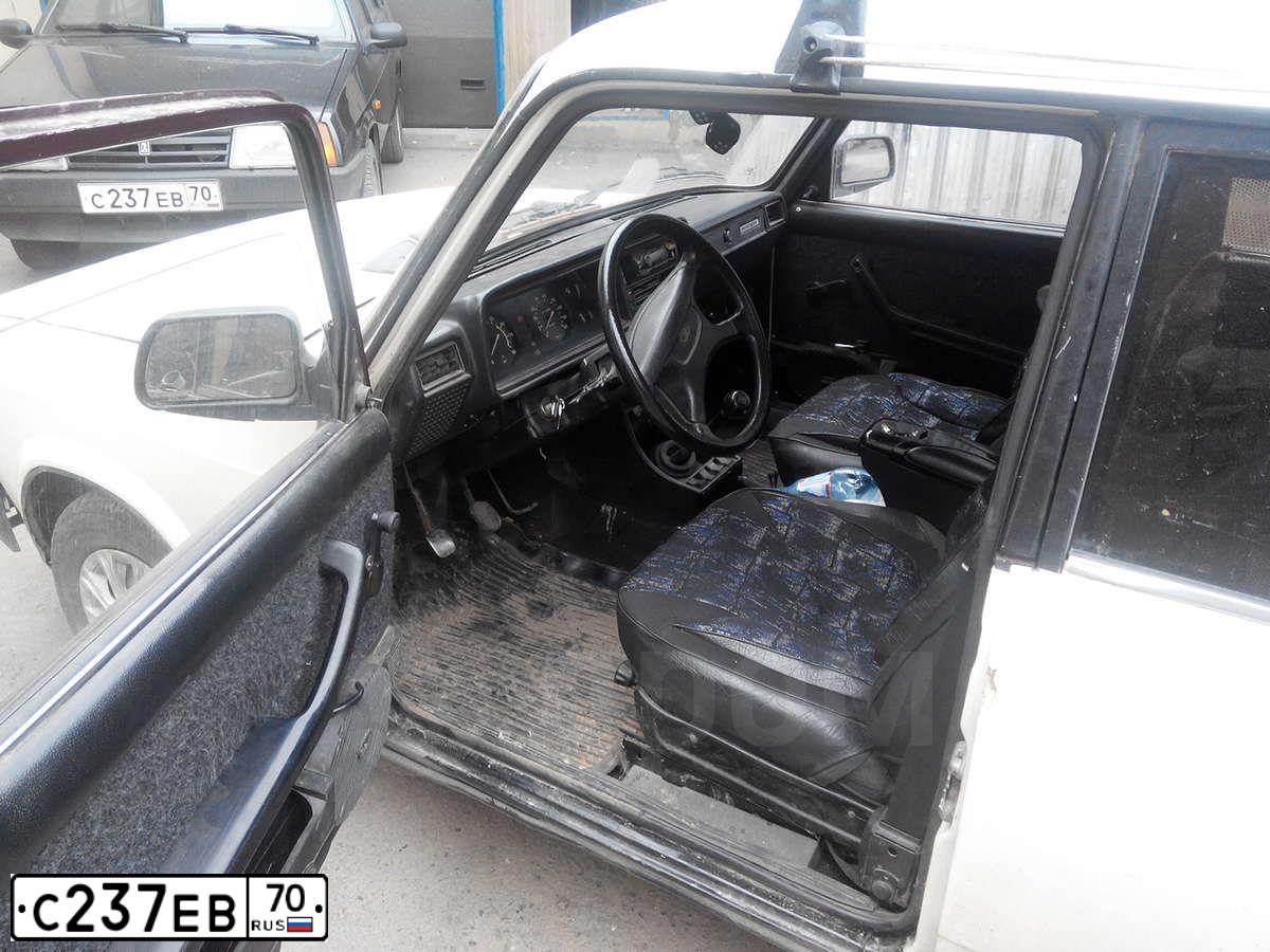 Фото автомобиля LADA 2109 SAMARA, 2003 — госномер С568РХ70. Цвет: ЧЕРНЫЙ