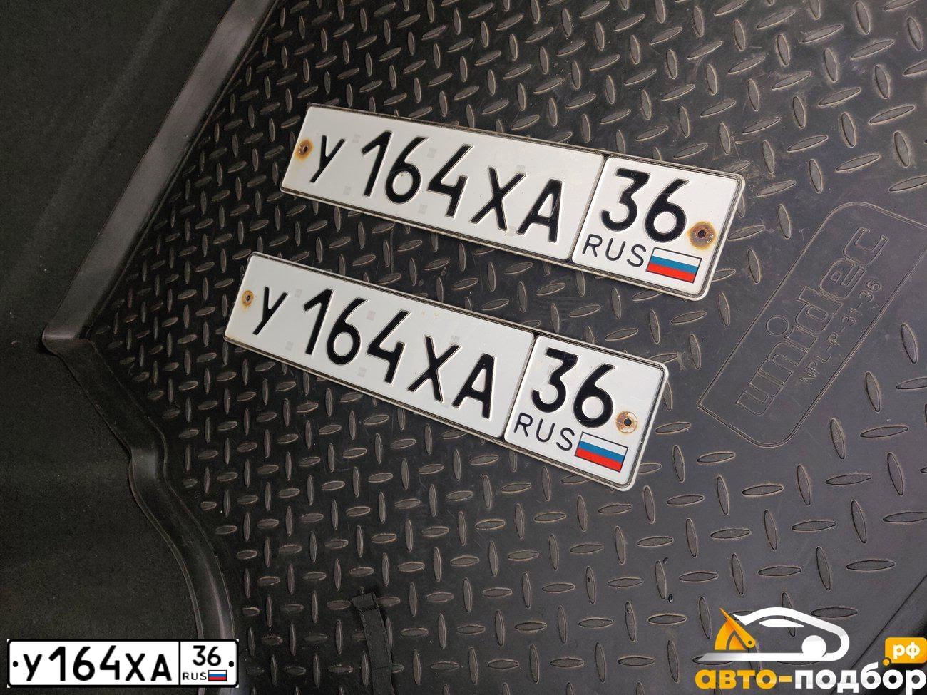 Фото автомобиля CHEVROLET AVEO, 2006 — госномер В331РР163. Цвет: Красный