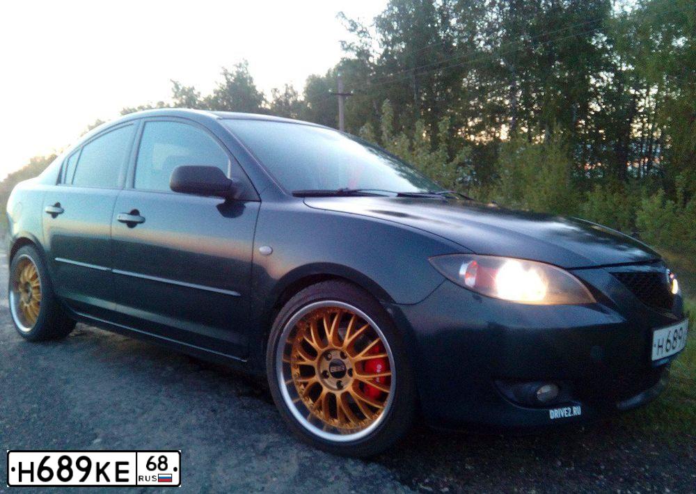 Фото автомобиля MAZDA 3, 2005 — госномер О735РН48. Цвет: ТЕМНО-ЗЕЛЕНЫЙ