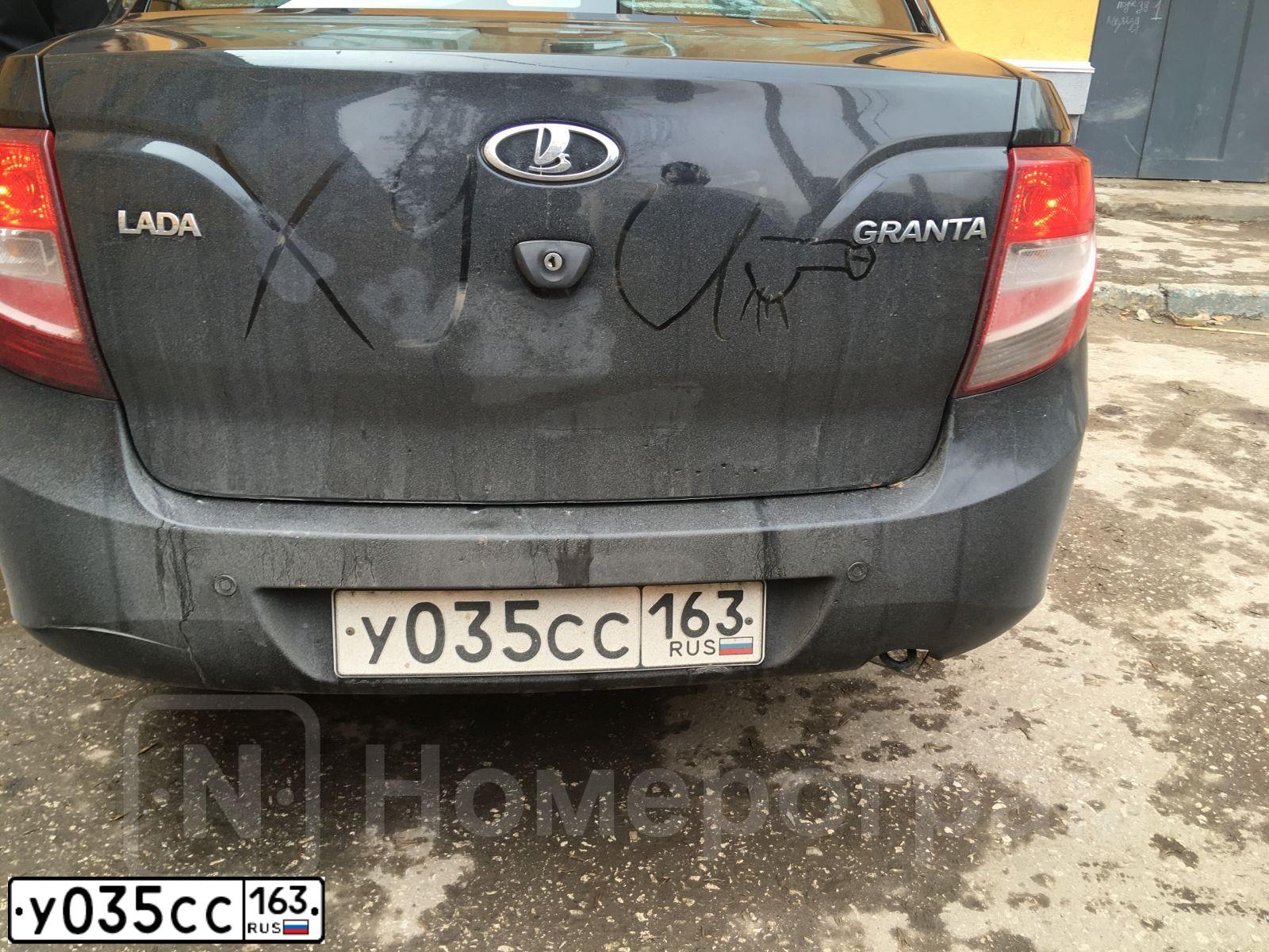 Фото автомобиля LADA 2190 GRANTA, 2014 — госномер У035СС163. Цвет: ЧЕРНЫЙ