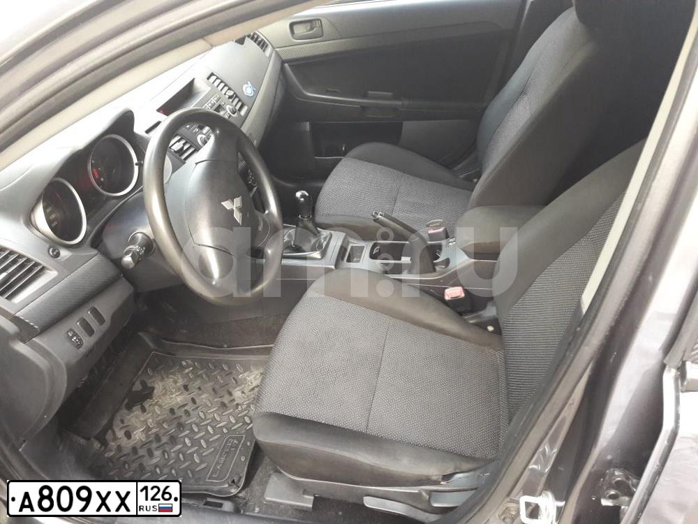 Фото автомобиля MITSUBISHI LANCER, 2008 — госномер А809ХХ126. Цвет: СЕРЫЙ