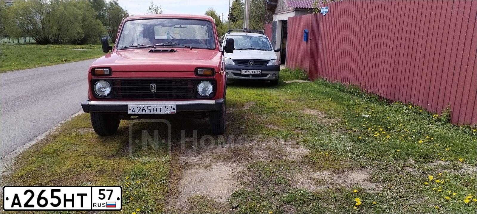Фото автомобиля LADA 2121 NIVA, 1994 — госномер М133АК50. Цвет: КРАСНЫЙ