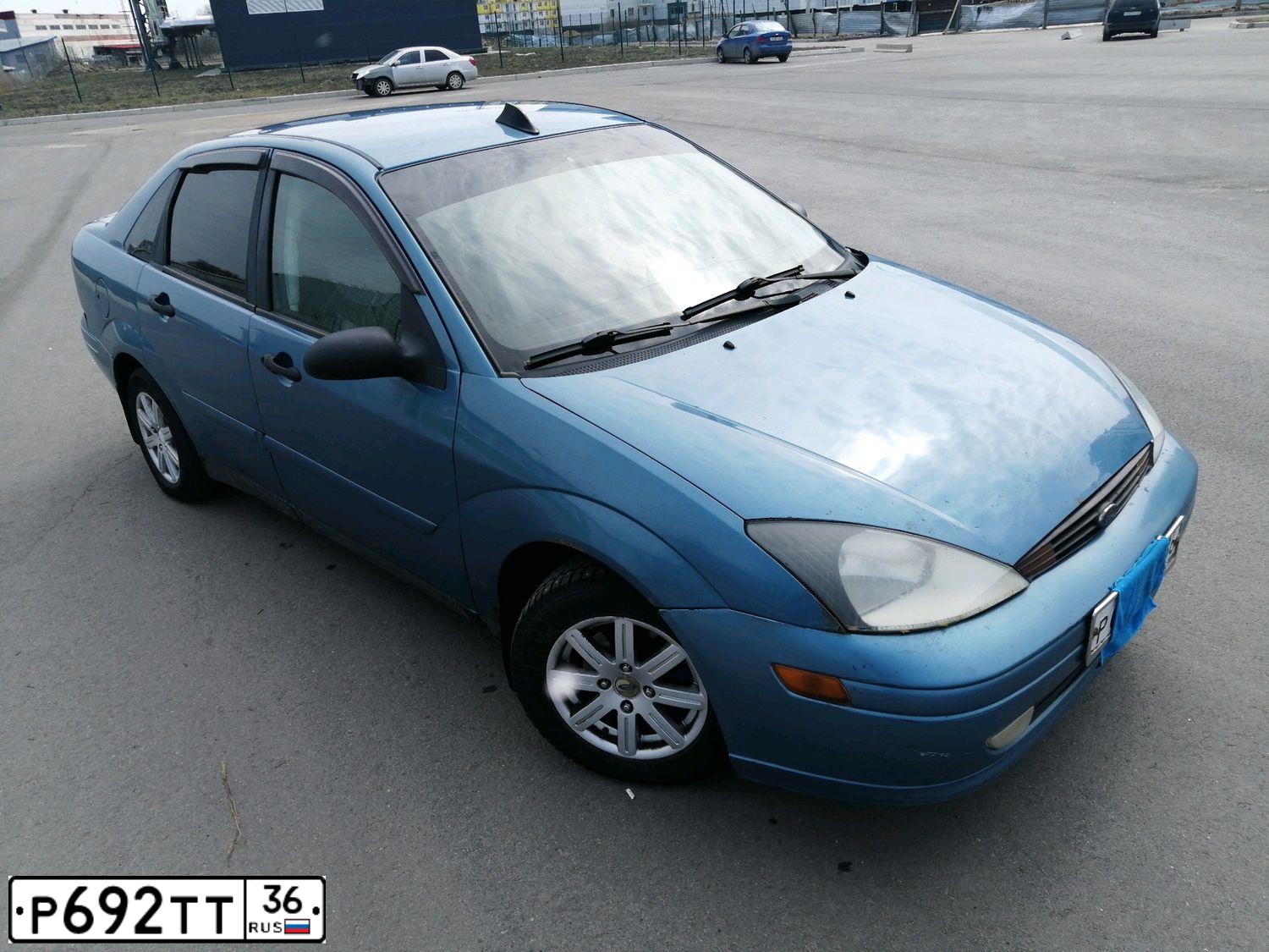 Фото автомобиля FORD FOCUS, 2001 — госномер Р692ТТ36. Цвет: ГОЛУБОЙ