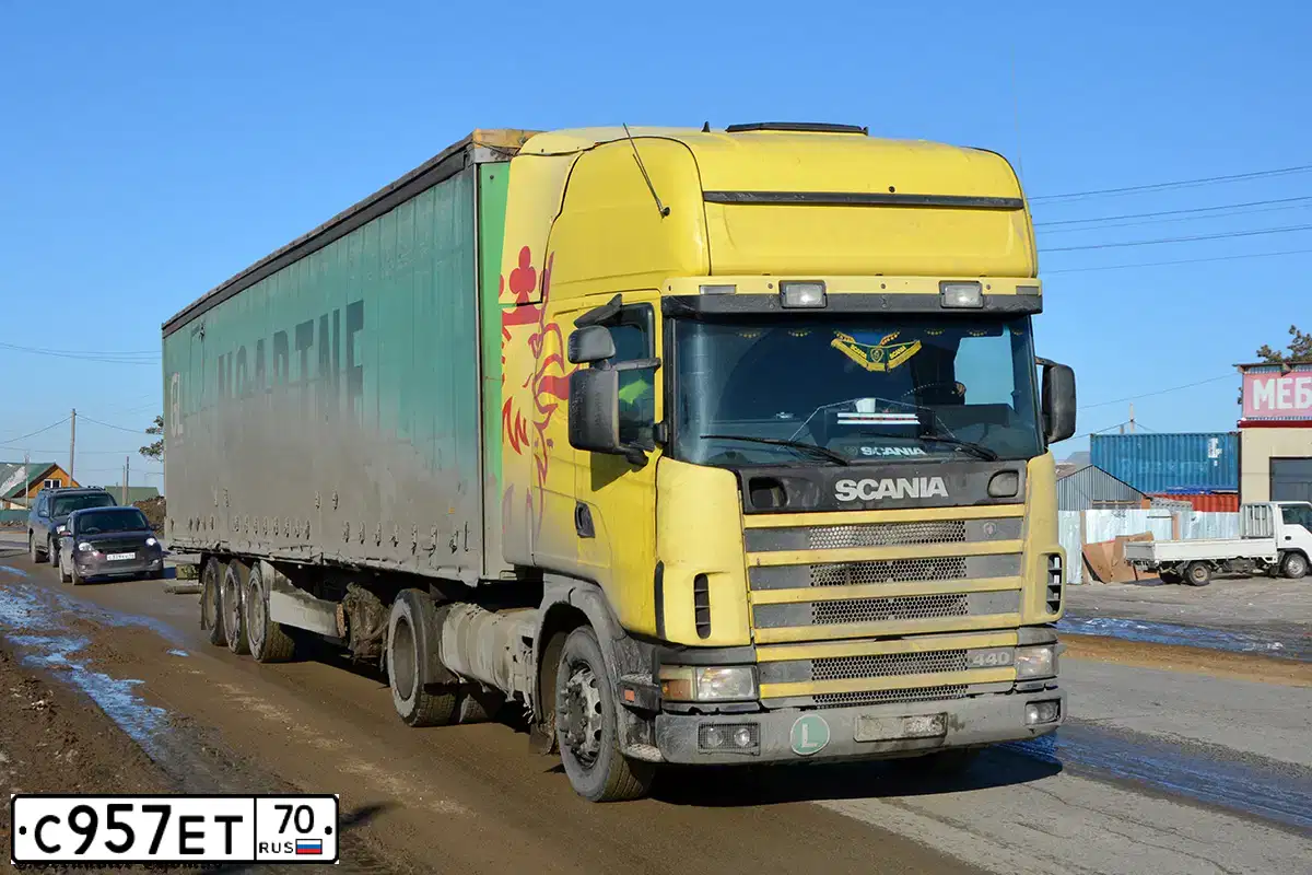 Фото автомобиля SCANIA SERIE R /4X2/, 2011 — госномер С957ЕТ70. Цвет: ЖЕЛТЫЙ