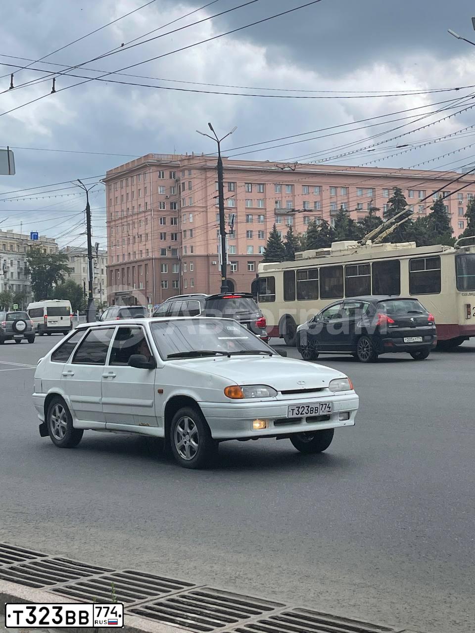 Фото автомобиля LADA 2114 SAMARA, 2011 — госномер Т323ВВ774. Цвет: Белый