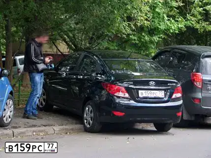 Фото автомобиля HYUNDAI SOLARIS, 2013 — госномер В159РС77. Цвет: ЧЕРНЫЙ