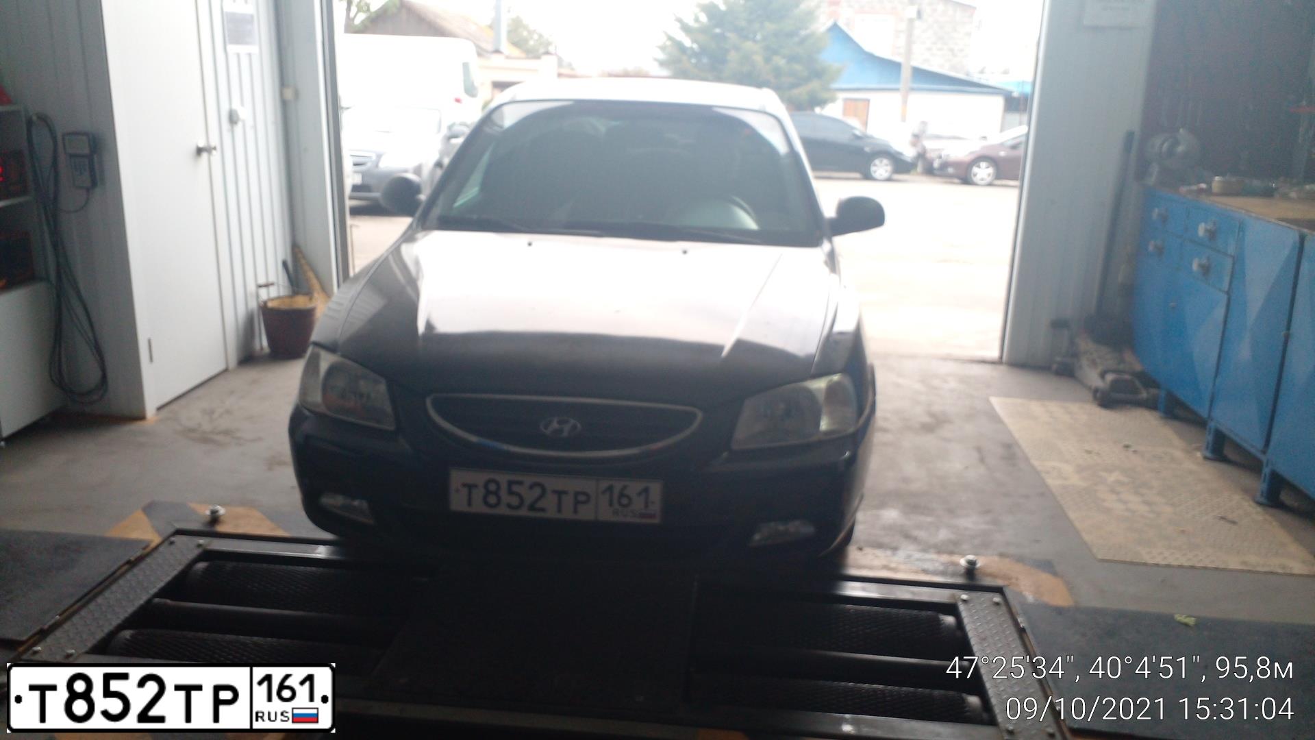 Фото автомобиля HYUNDAI ELANTRA, 2009 — госномер Т852ТР161. Цвет: ВИШНЕВЫЙ