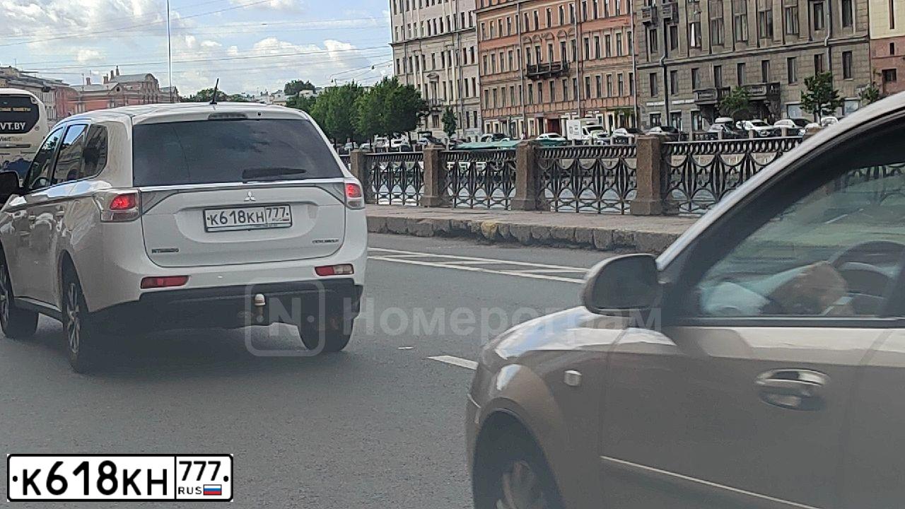 Фото автомобиля MITSUBISHI OUTLANDER, 2014 — госномер К618КН777. Цвет: БЕЛЫЙ
