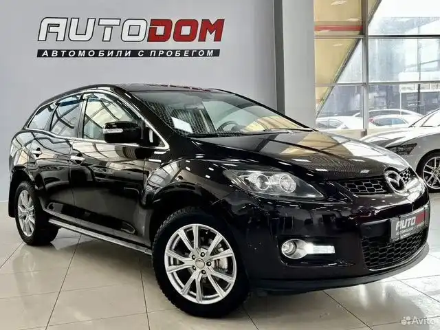 Фото автомобиля MAZDA CX-7, 2008 — госномер О505РК124. Цвет: ТЕМНО-ВИШНЕВЫЙ