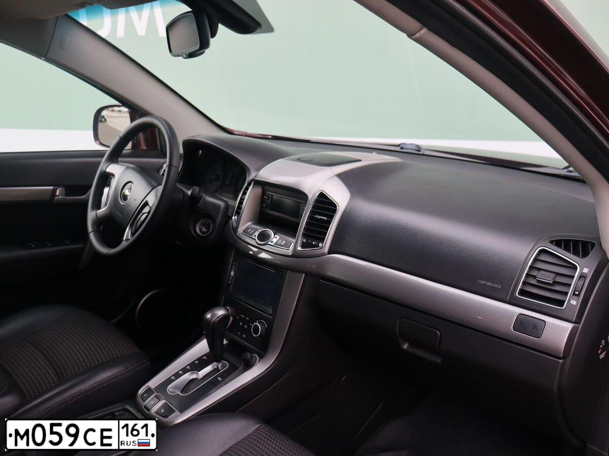 Фото автомобиля CHEVROLET CAPTIVA, 2013 — госномер М059СЕ161. Цвет: Красный