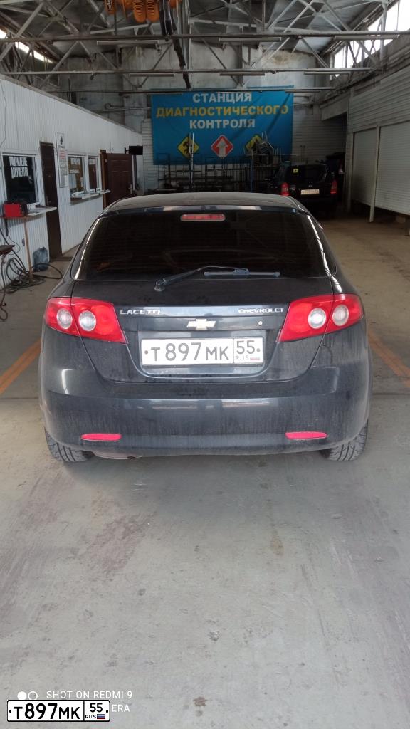 Фото автомобиля CHEVROLET LACETTI, 2011 — госномер Т897МК55. Цвет: ЧЕРНЫЙ