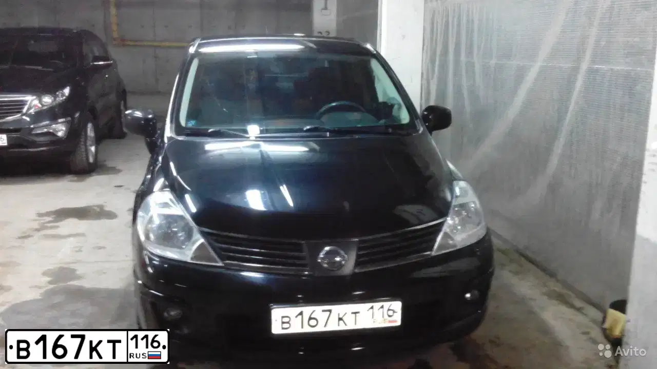 Фото автомобиля NISSAN TIIDA, 2010 — госномер М291ЕТ21. Цвет: ЧЕРНЫЙ