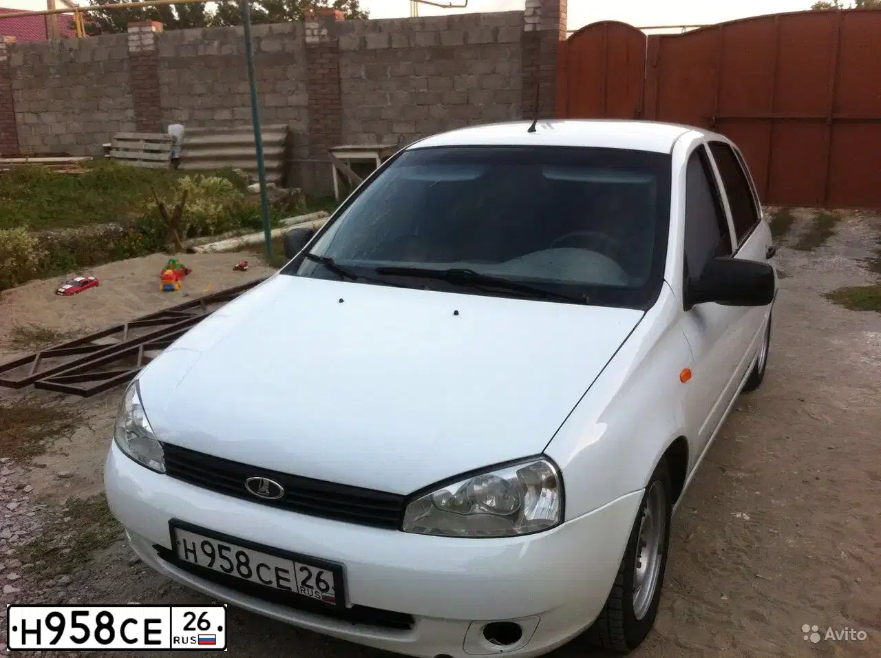 Фото автомобиля LADA KALINA, 2012 — госномер Н703РК15