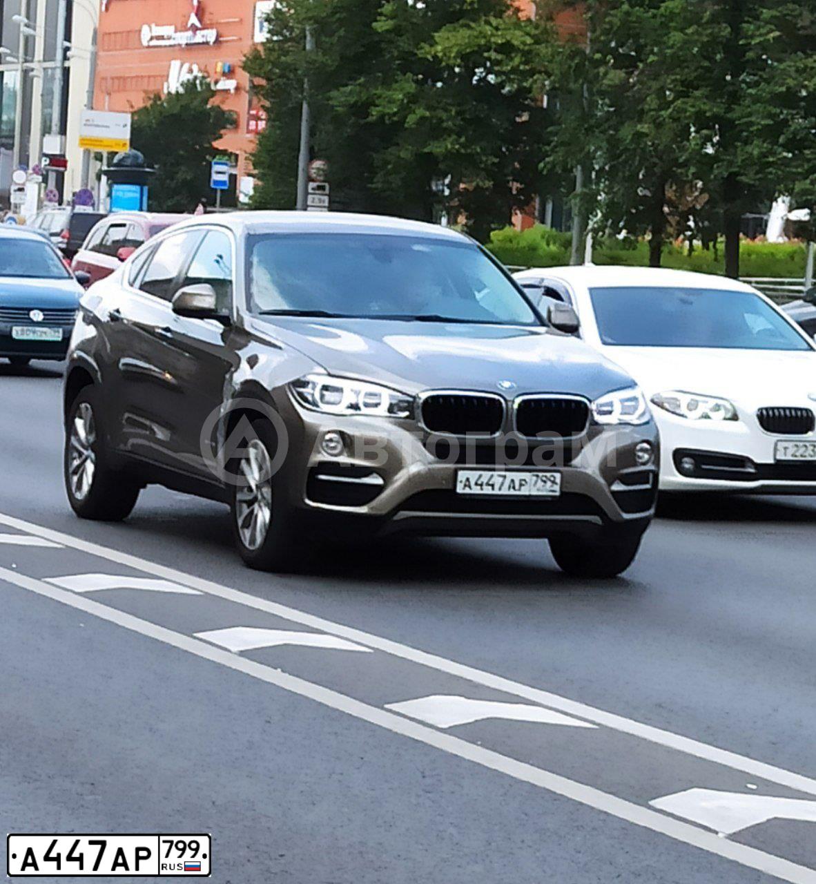 Фото автомобиля BMW X6, 2017 — госномер А447АР799. Цвет: КОРИЧНЕВЫЙ