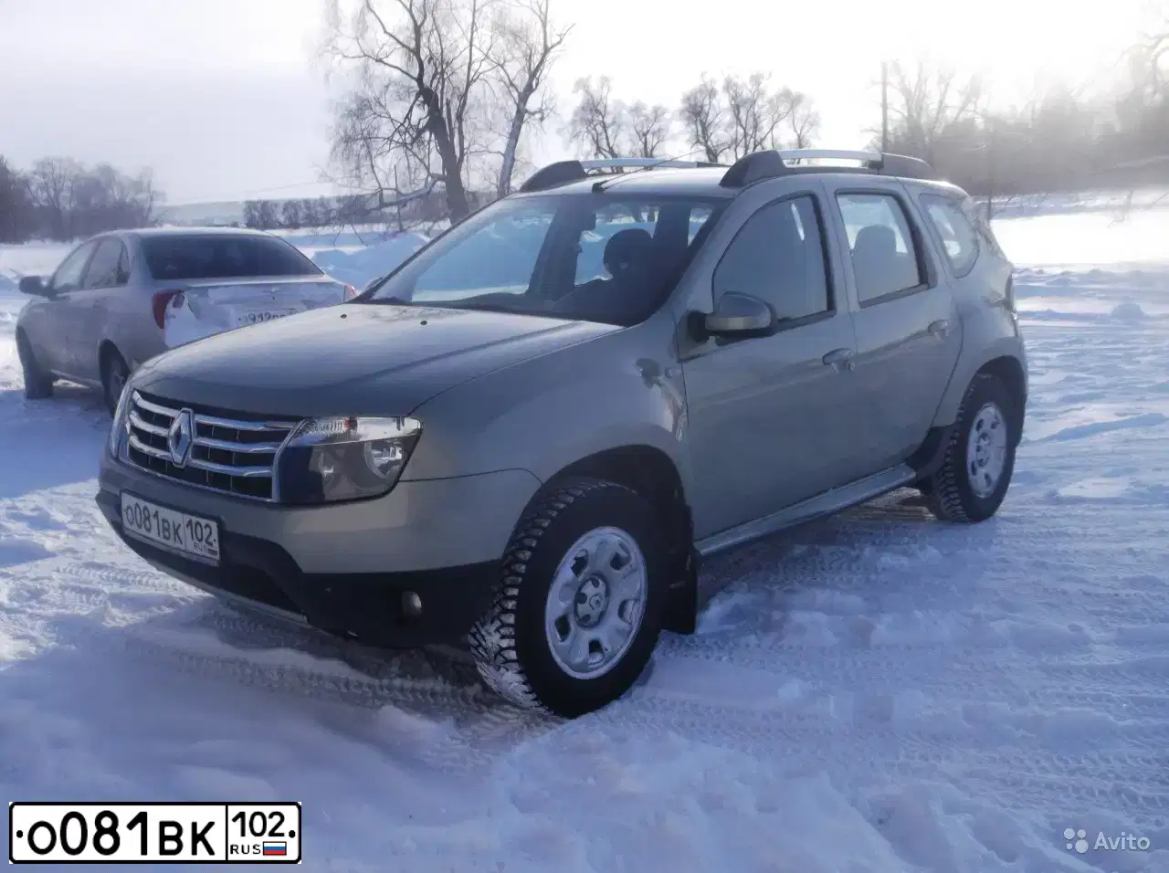 Фото автомобиля RENAULT DUSTER, 2012 — госномер Е176УО702. Цвет: БЕЖЕВЫЙ