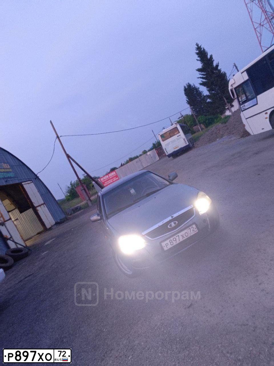 Фото автомобиля LADA 2172 PRIORA, 2011 — госномер Р897ХО72. Цвет: СРЕДНИЙ СЕРО-ЗЕЛЕНЫЙ МЕТ.