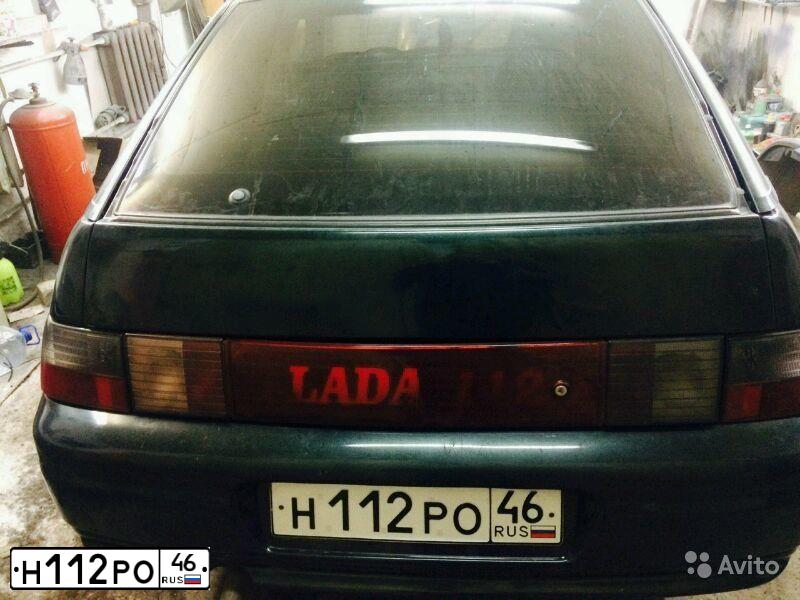 Фото автомобиля LADA 2112 LADA, 2001 — госномер М531ТР31. Цвет: ТЕМНО-ЗЕЛЕНЫЙ