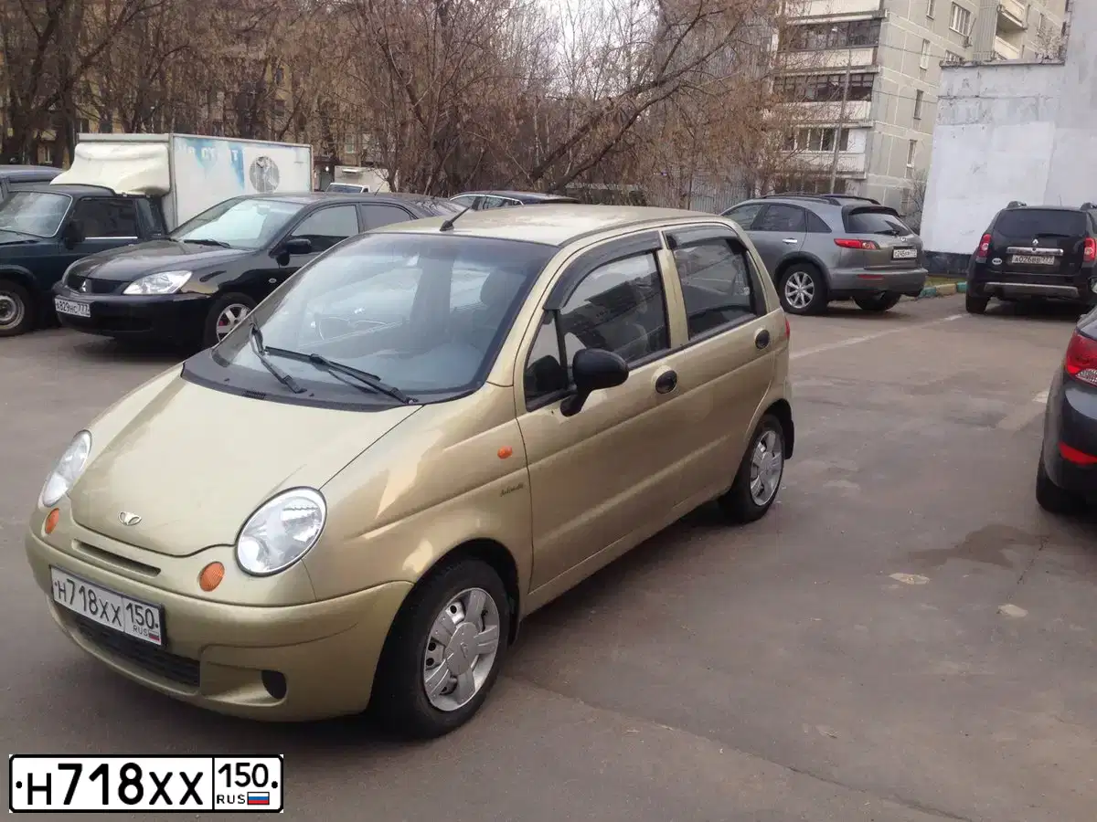 Фото автомобиля DAEWOO GENTRA, 2014 — госномер Е209МУ750. Цвет: СЕРЫЙ