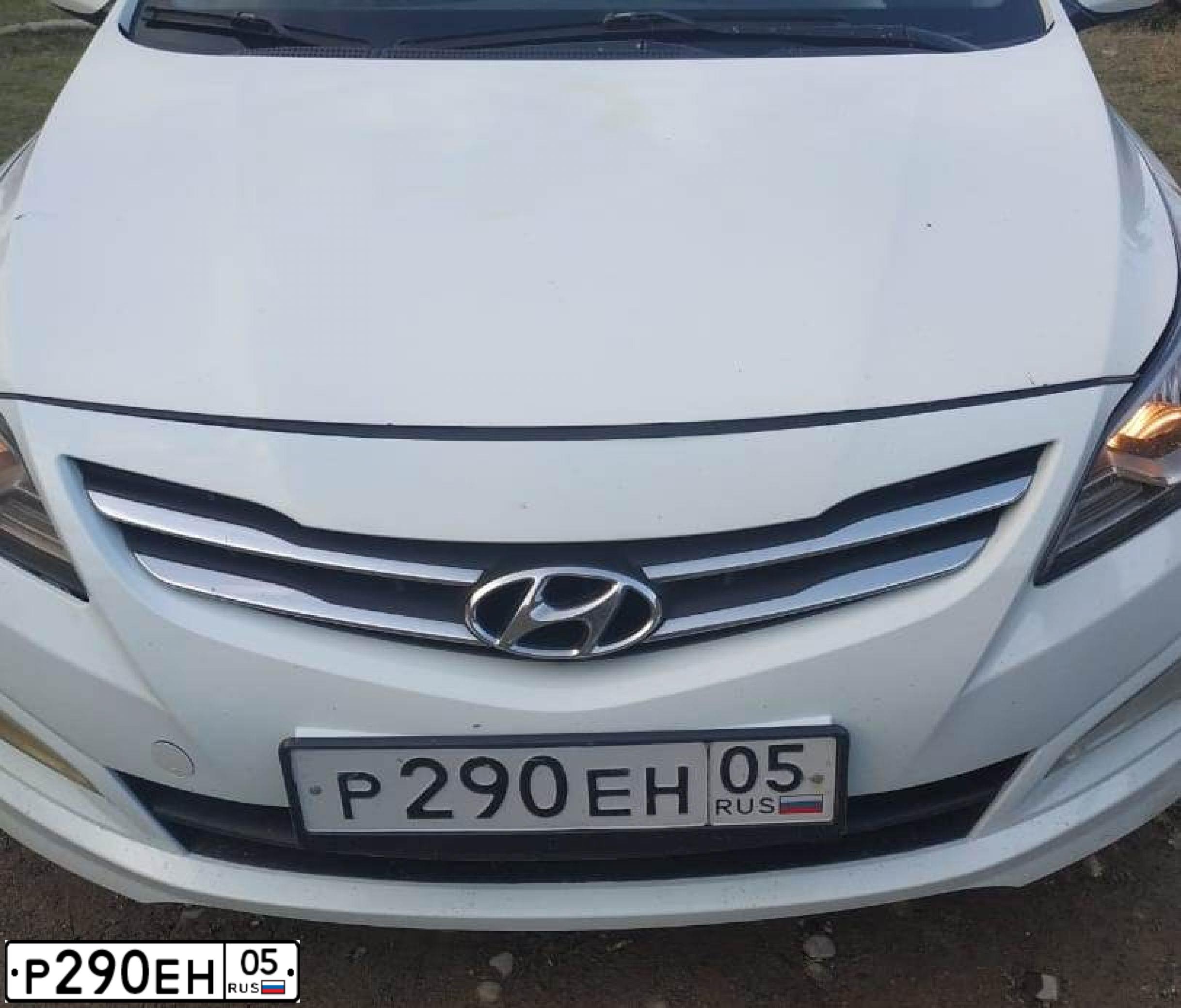 Фото автомобиля HYUNDAI SOLARIS, 2015 — госномер Р290ЕН05. Цвет: БЕЛЫЙ-ЖЕЛТЫЙ-СЕРЫЙ
