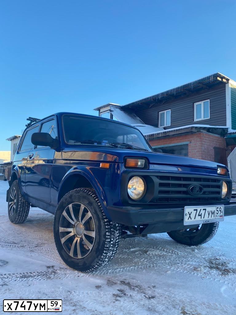 Фото автомобиля LADA 2121 NIVA, 2009 — госномер Х747УМ59. Цвет: ТЕМНО-СИНИЙ