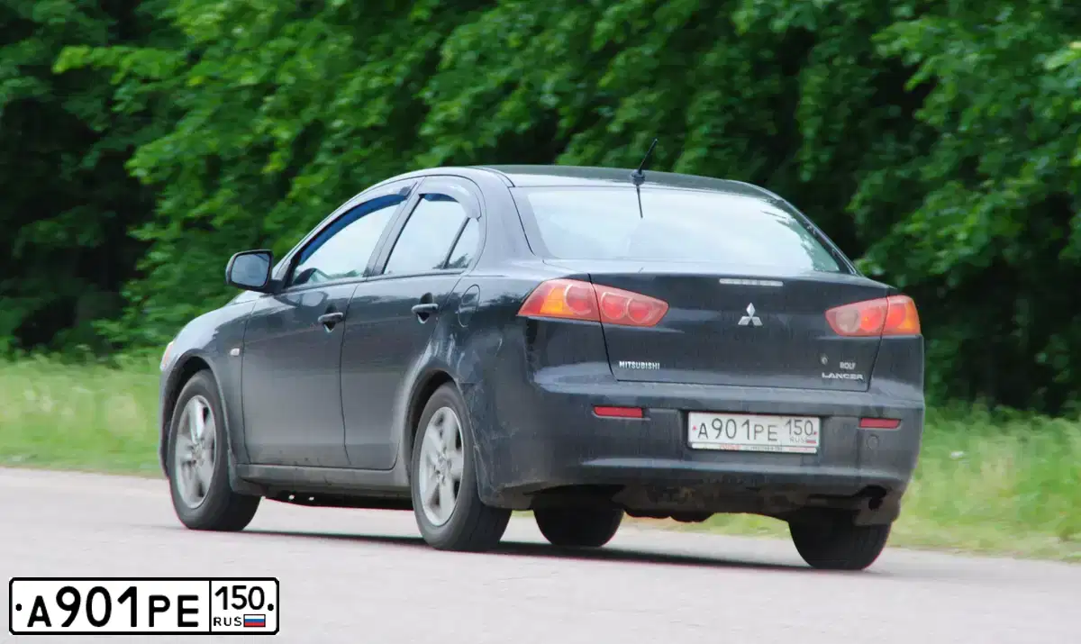 Фото автомобиля MITSUBISHI LANCER, 2008 — госномер А901РЕ150. Цвет: ЧЕРНЫЙ